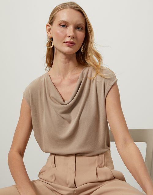Beige knitted blouse with plunging neckline