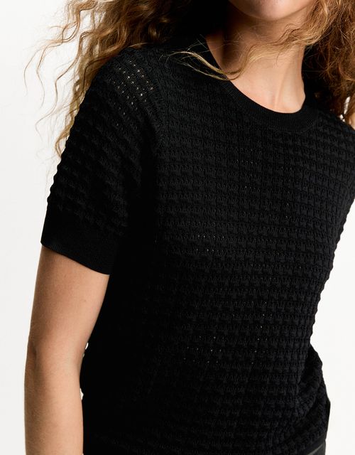 Black textured knit blouse