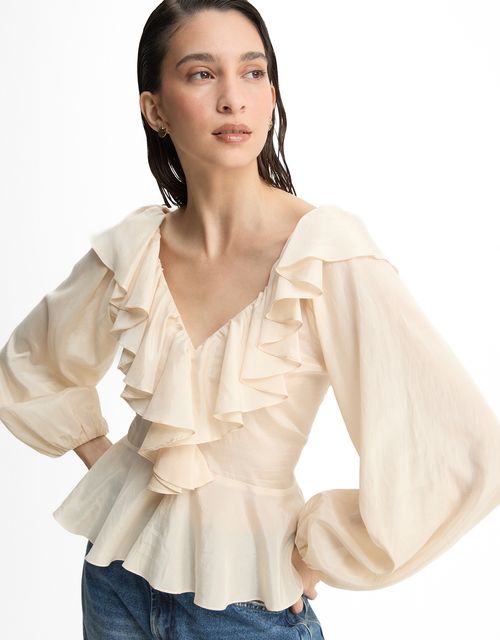 Loose blouse with ruffles