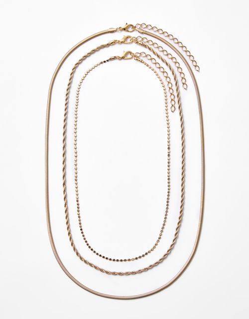 Trio of delicate metal necklaces